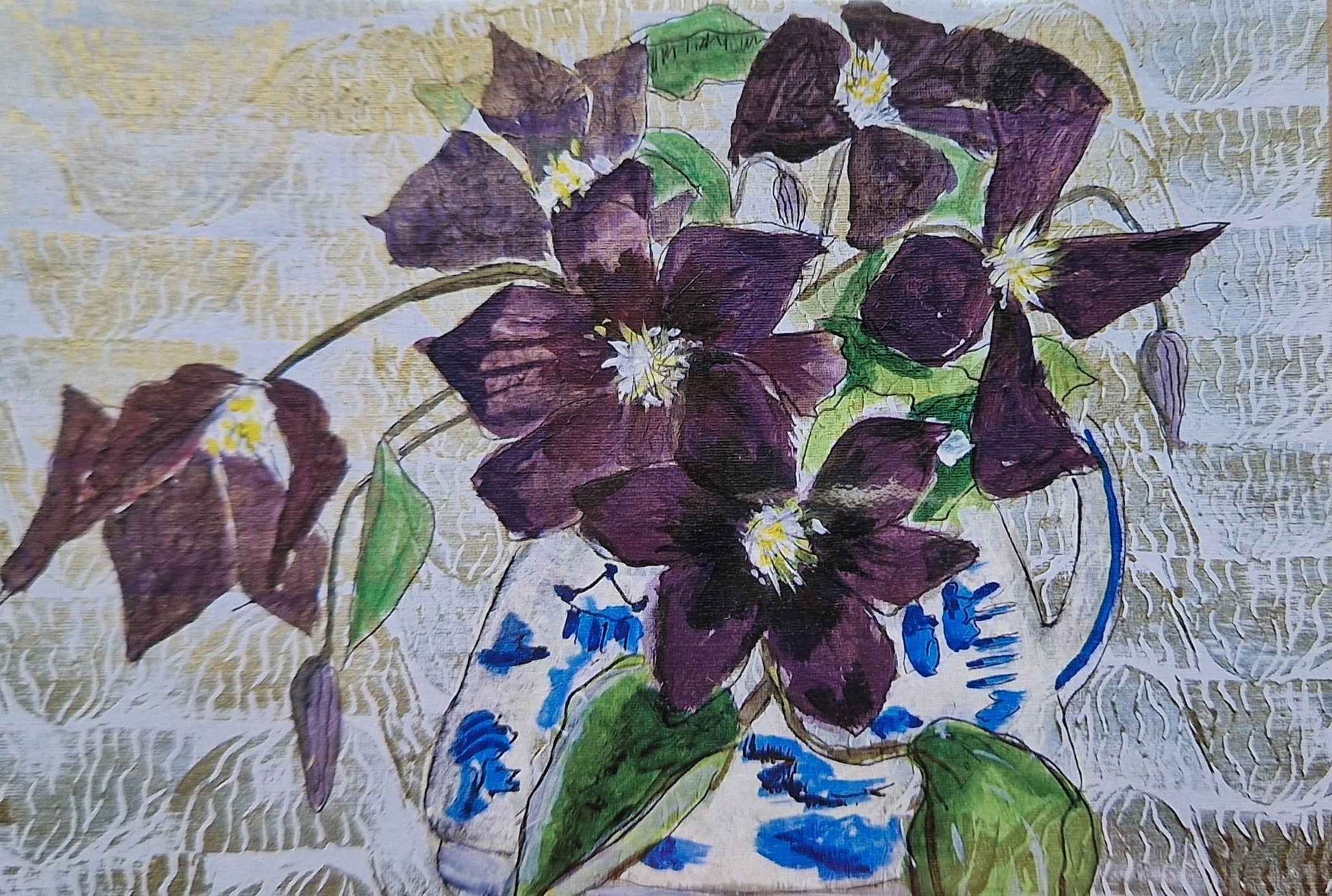 Clematis in a blue and white  jug