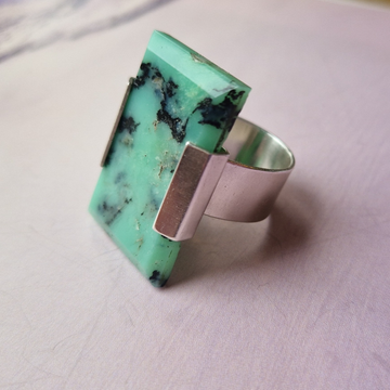 Silver bracket ring with chocolate chrysoprase stone