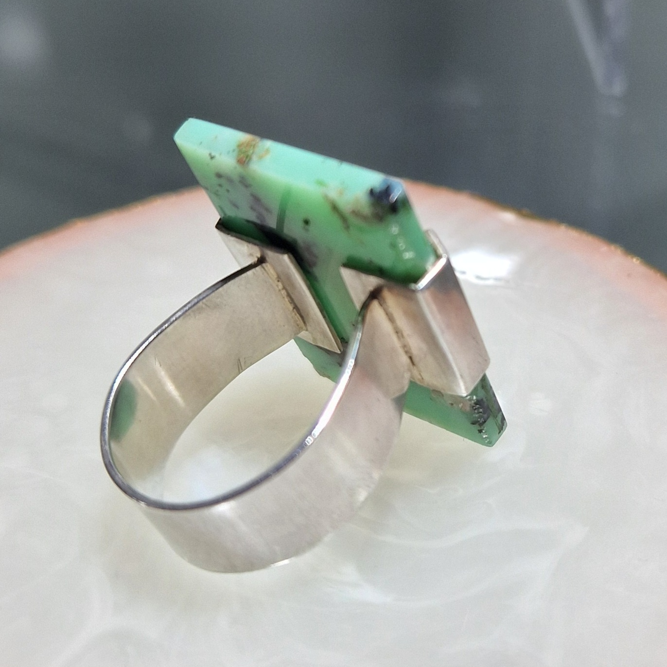 Silver bracket ring with chocolate chrysoprase stone