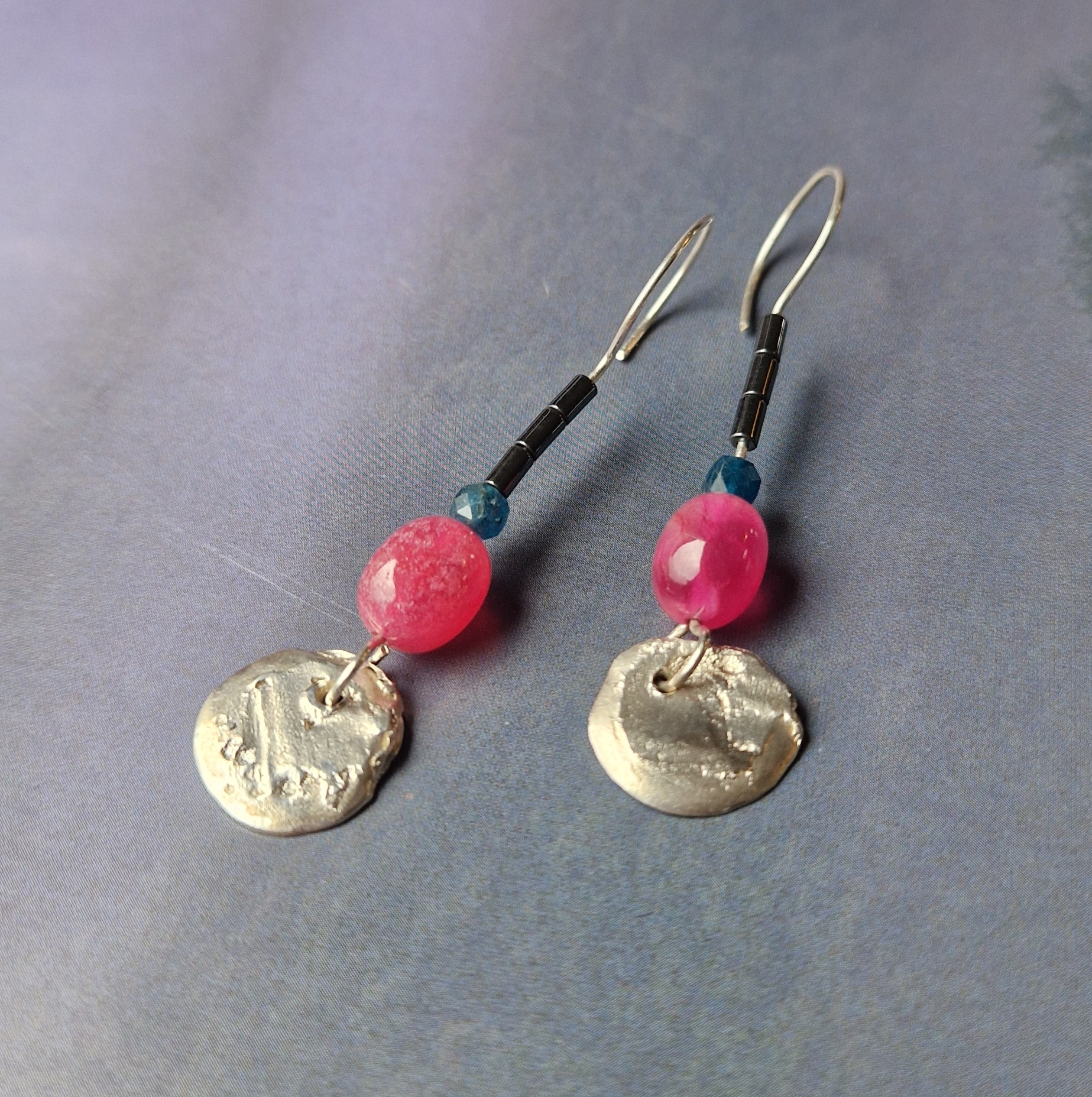Silver earrings with rubies, apatites and haemetites