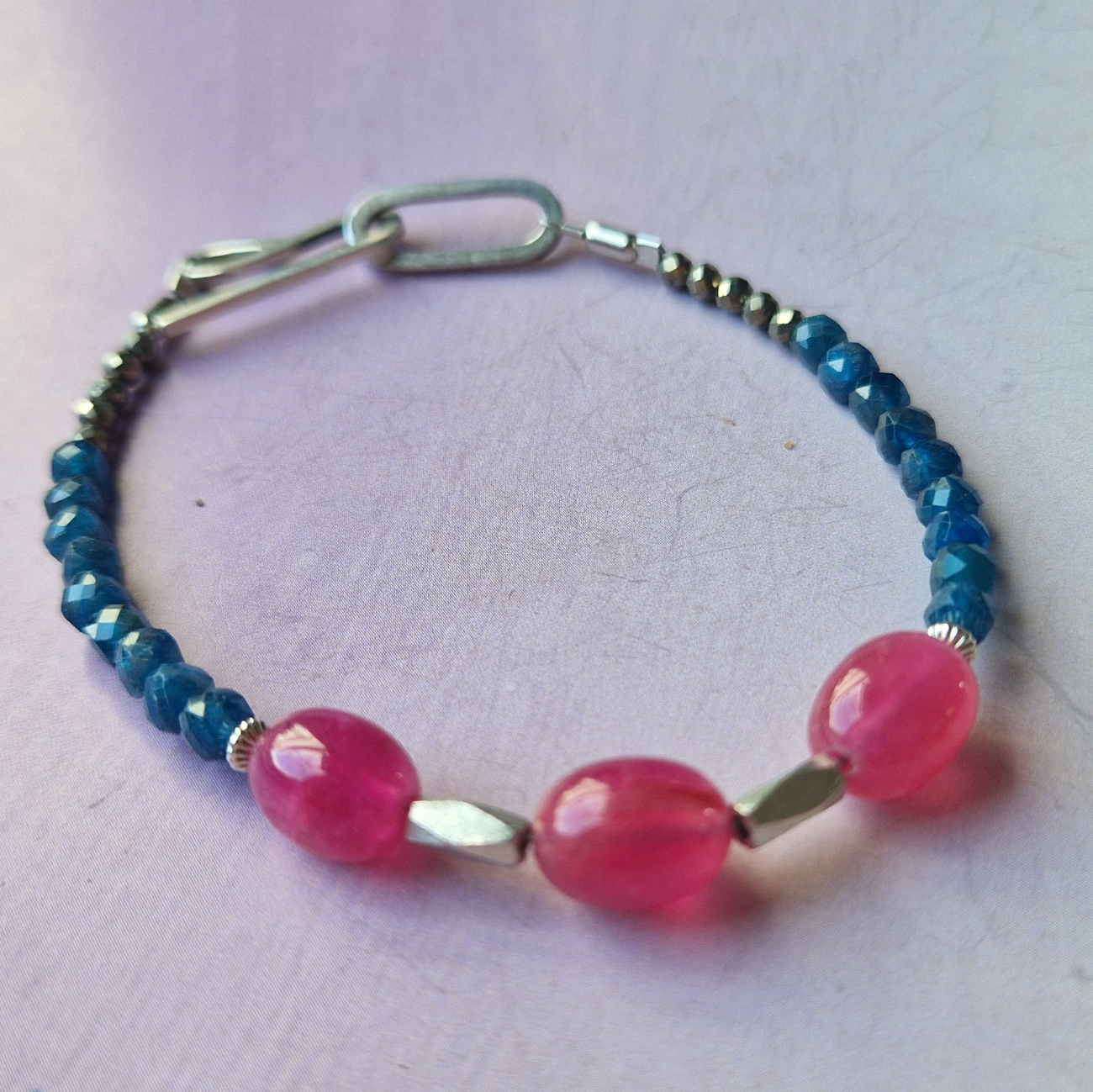 Silver bracelet with blue apatite, haemetites and ruby stones
