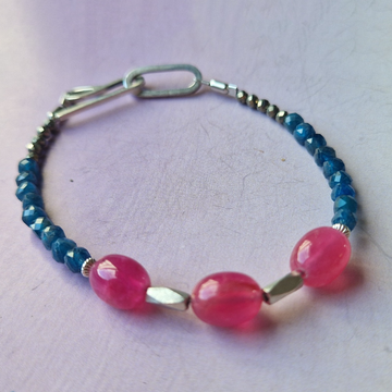Silver bracelet with blue apatite, haemetites and ruby stones