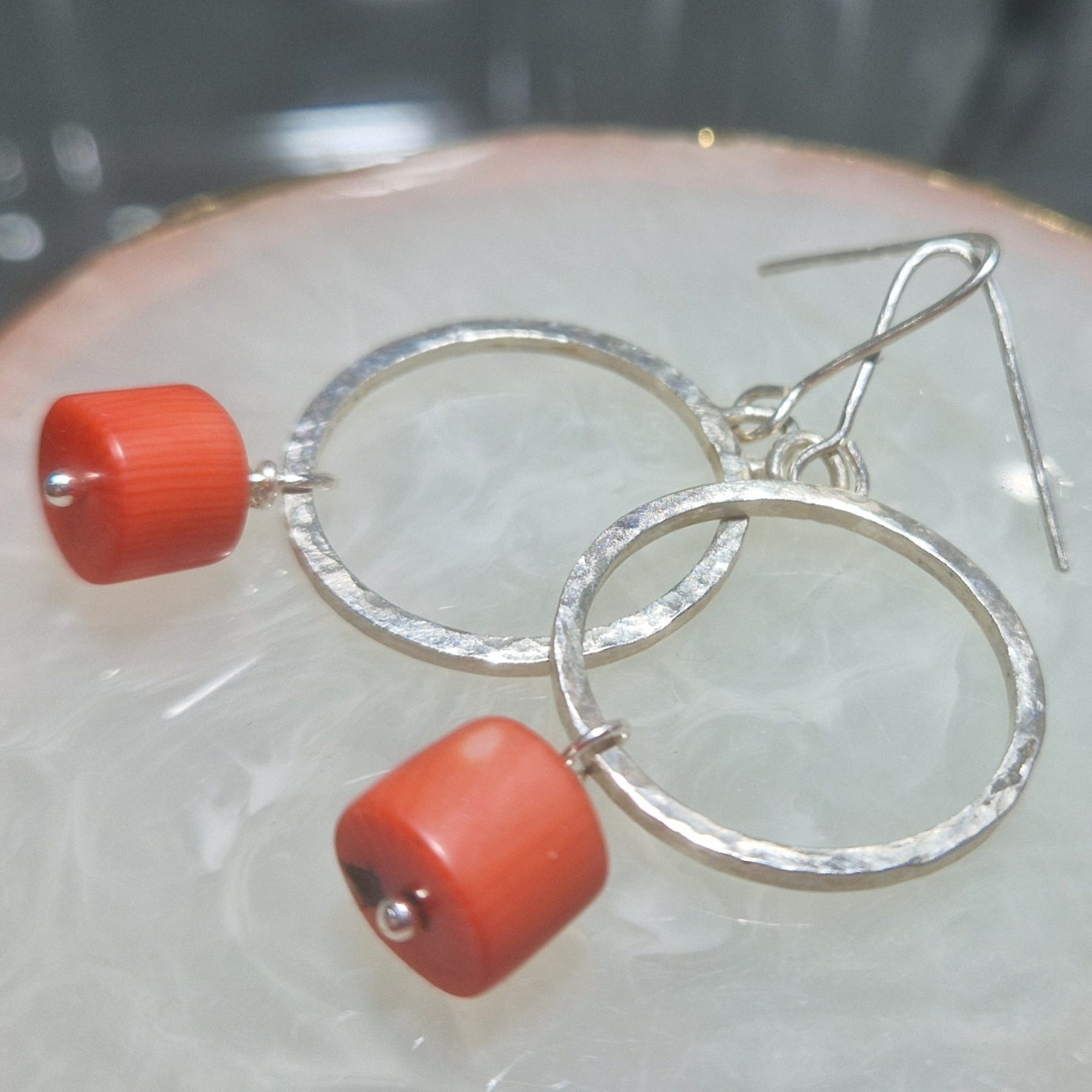 Hammered silver earrings with coral drops