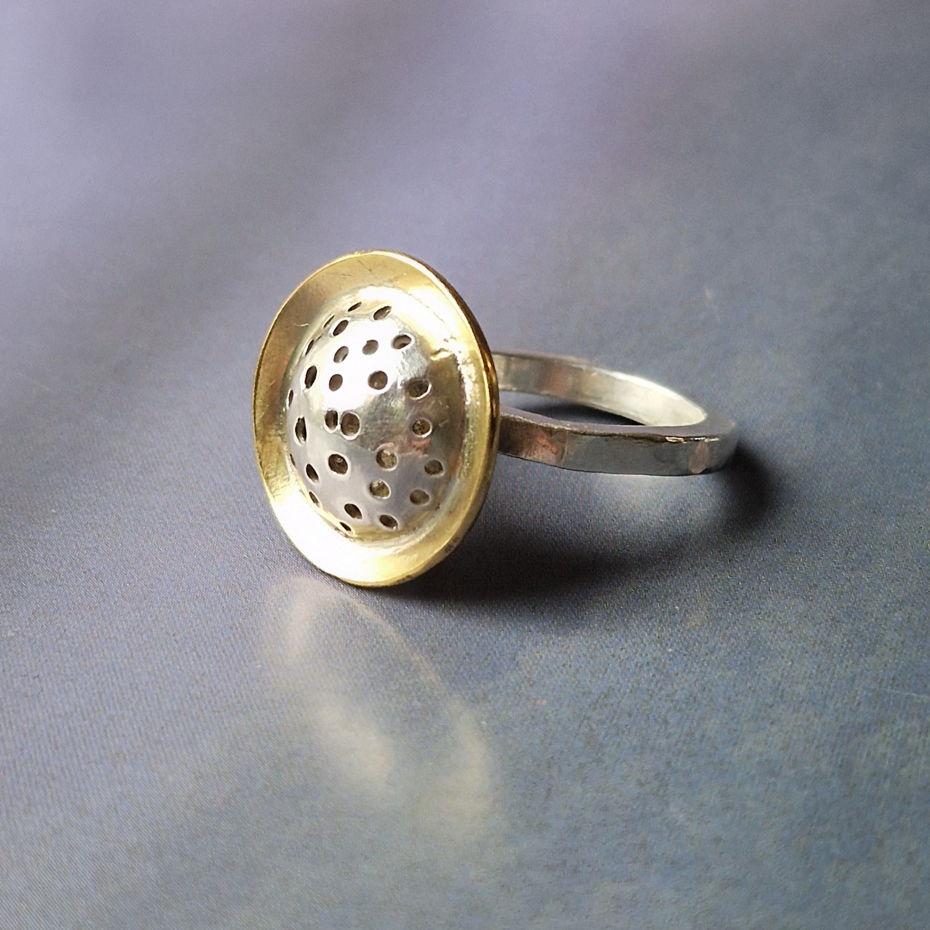 Silver ring with pierced dome