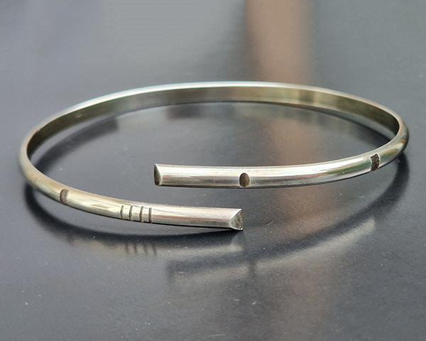 Oxidised silver bypass oval bangle